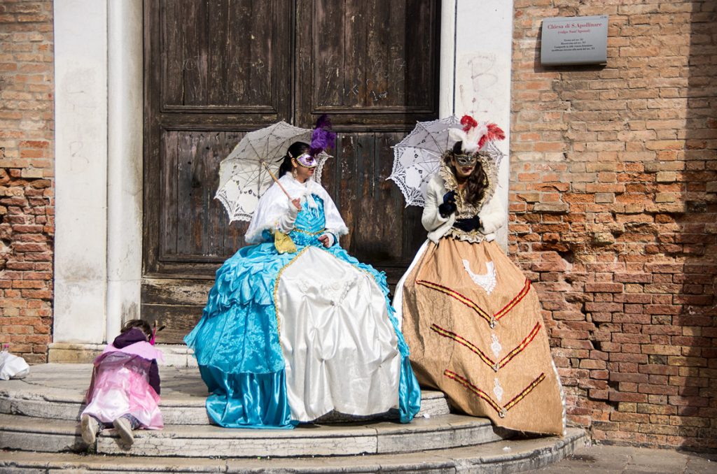 Two Women and a Girl on Palace Steps