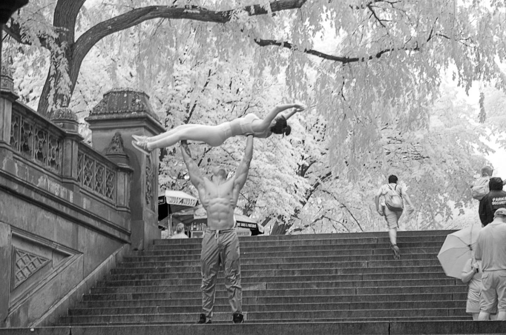 Hoisting a Woman on the Steps