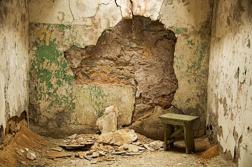 Green Bench and Broken Plaster