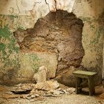 Green Bench and Broken Plaster